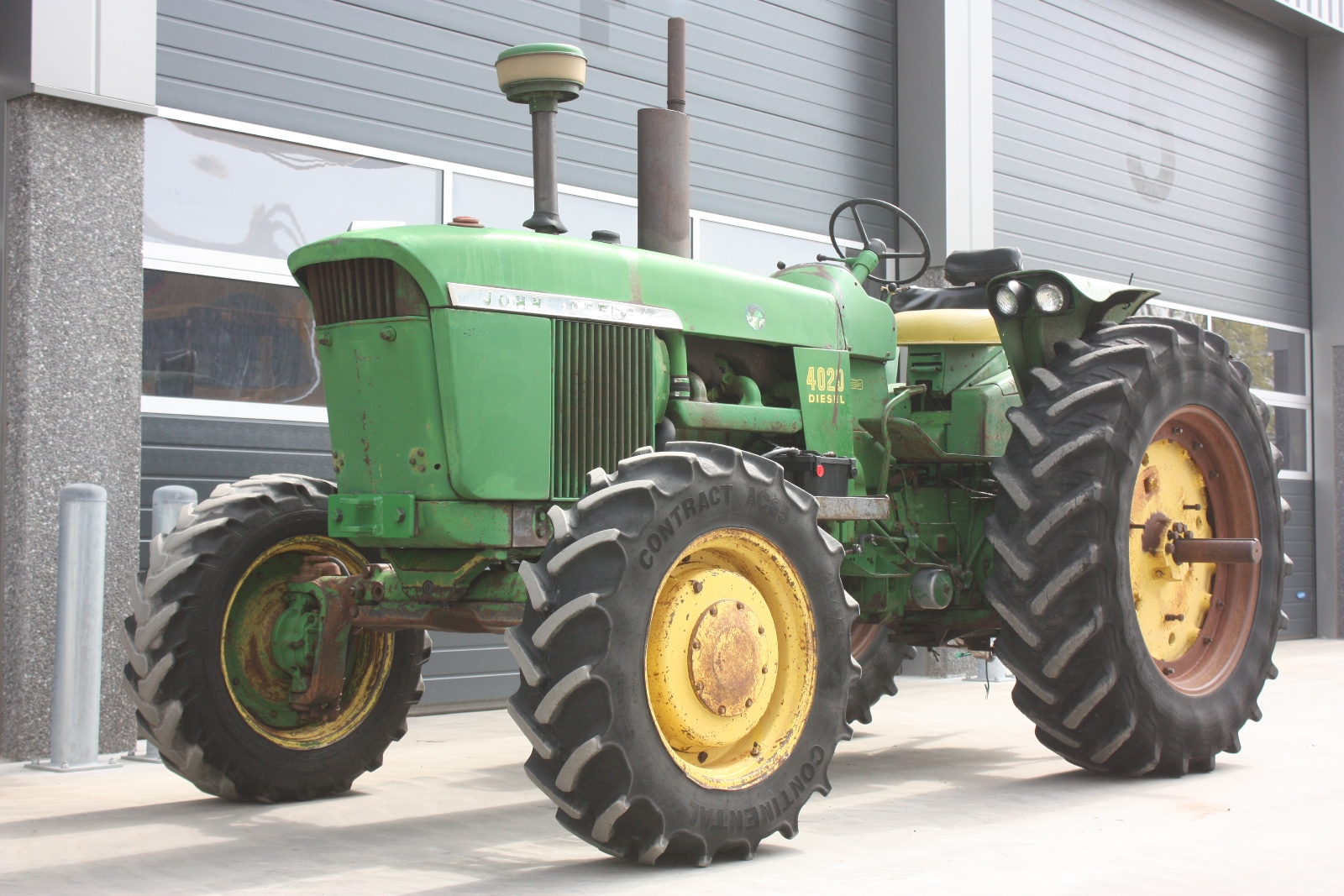 JOHN DEERE 4020 4WD 1969 Vintage tractor | Van Dijk Heavy Equipment